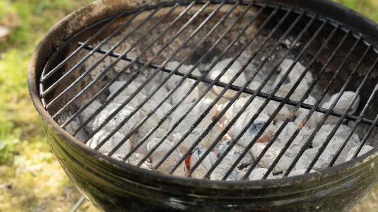charcoal grill damp coals ash buildup