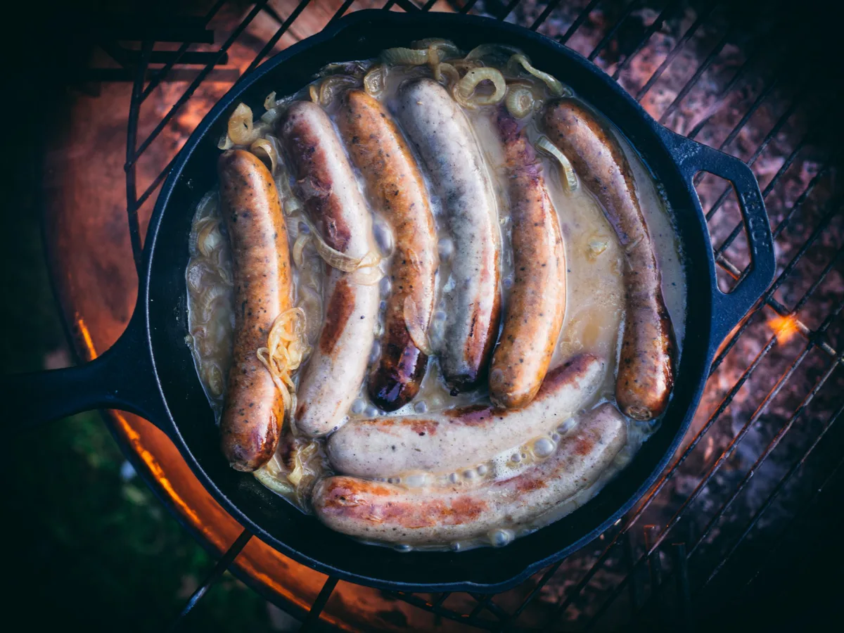 poaching sausages before grilling